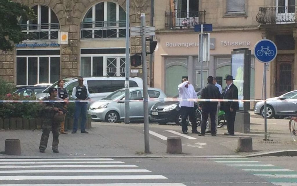 Police cordon off the area where the stabbing is reported to have taken place