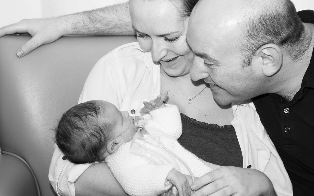 Isaac with his parents Steven and Rachel