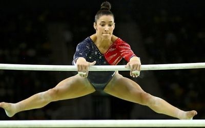 Aly Raisman helped the American artistic gymnastic team to gold in the women's team event