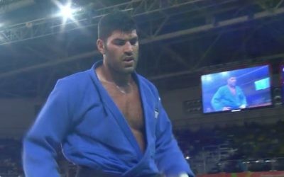 Sasson trudges off the mat having lost his semi-final in dramatic style