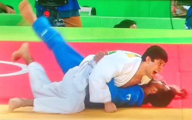 Sagi Muki (blue) on the end of an Ippon which ended his medal hopes