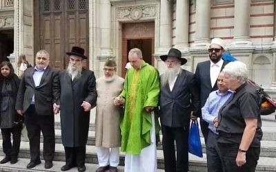 Members of different faiths together at a vigil in 2016
