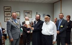 Representatives of the Jewish community of Canvey island invited to a mayor's reception at Castle Point council where they were presented with the Seal of the Council. (September 2016). Joel Friedman is in the centre.