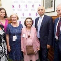 Sajid Javid MP (second from the right) with Susan Pollack MBE and Lily Ebert BEM are both standing with Laura Marks OBE, HMDT Chief Executive Olivia Marks-Woldman, and John Hajdu.