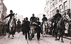 A demonstrator is taken away under arrest by police officers after a mounted baton charge, in East London, on Oct. 4, 1936, to stop fighting between anti-fascists and Sir Oswald Mosley's blackshirts. A demonstrator is taken away under arrest by police officers after a mounted baton charge, in East London, on Oct. 4, 1936, to stop fighting between anti-fascists and Sir Oswald Mosley's blackshirts.