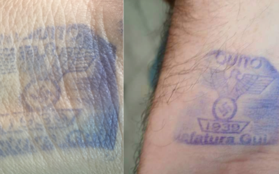 Nazi-themed hand stamps being used to mark visitors to a jail in Quito, Ecuador (Twitter)