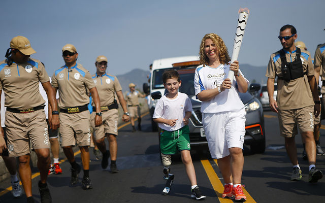 Rio and mum Juliette with the Paralympic Flame