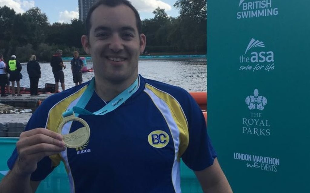 Adam Warner with his gold medal