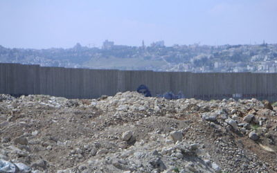 A wall snaking through the West Bank, which separates Jewish and Palestinian areas