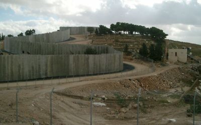 A wall snaking through the West Bank, sectioning off Jewish and Palestinian areas
