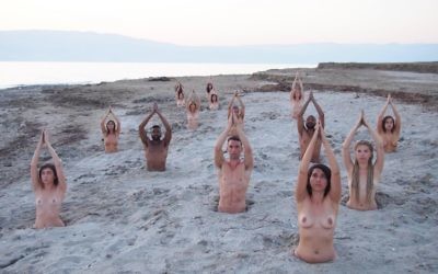 Artist Spencer Tunick invited 15 male and female nude volunteers to help raise awareness of the environmental impact on the Dead Sea. Credit: Spencer Tunick