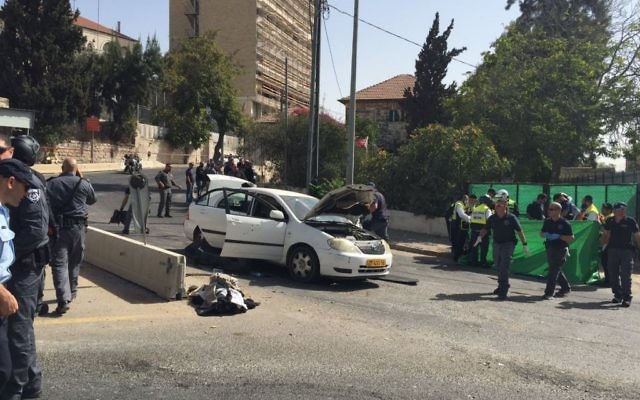 The scene of the attacker's car at the Jerusalem shooting