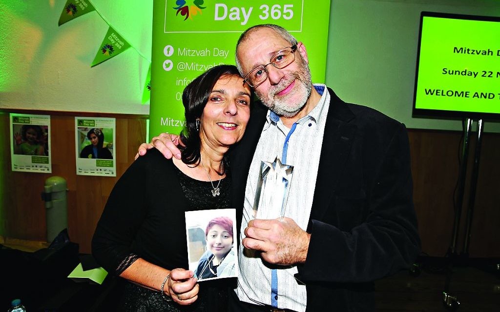 Last year's posthumous winner's parents John and Judith Morgan receive the award on behalf of their daughter Rachel