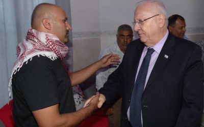 President Reuven Rivlin of Israel meeting with the father of slain teenager Nimer Abu Amar,   (Mark Neiman/Israeli Government Press Office)