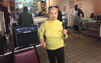 Gina Zuckerman at the senior center where she volunteers in New York City. (Facebook)