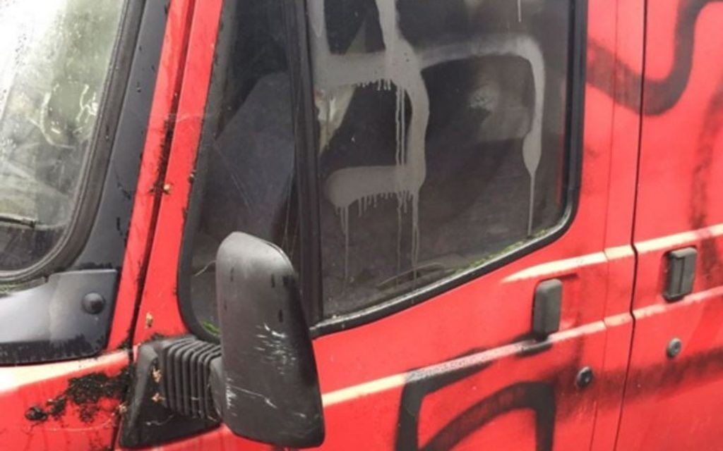 Vehicles daubed with swastikas opposite Beis Malka Girls School in Stamford Hill, north London. (Photo credit: Shomrim/PA Wire)