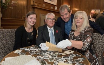 Caitriona Topping (left), Robert O'Brien (second left), Joyce Greenlees and Moderator Rev Russell Barr, attending a special reunion to view Jane Haining's handwritten will. (Photo credit: Andrew O'Brien/Church of Scotland/PA)