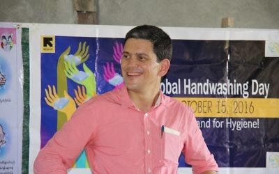 David Miliband in a Rakhine State community in Myanmar, where he heard how IRC has empowered them and changed their lives. (Credit: IRC/Jennifer Harrison)