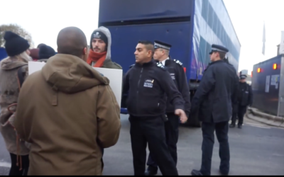 Protesters confronted by the police after storming the kosher slaughterhouse