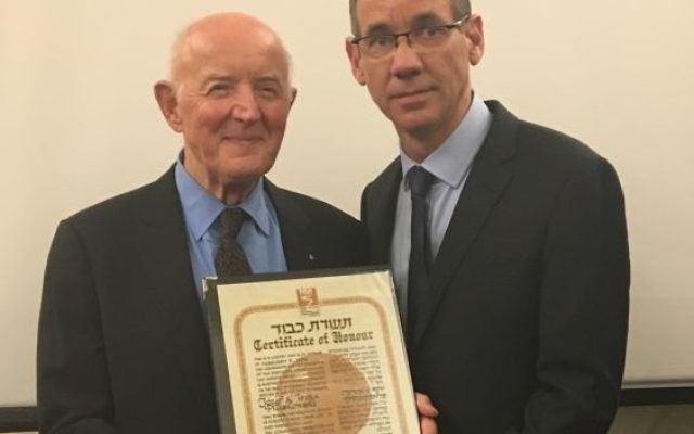 Ambassador Mark Regev presenting Andrzej Pluskowski with the official title of Righteous Amongst the Nations, on behalf of his parents, at the Embassy of Israel