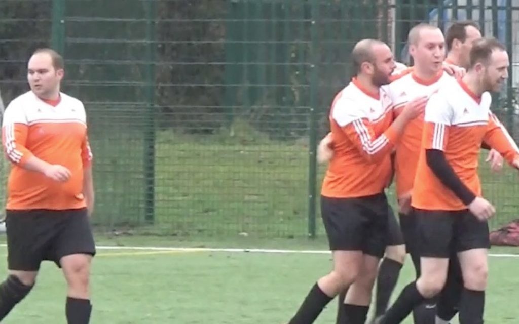 L'Equipe celebrate Andy Smith's goal