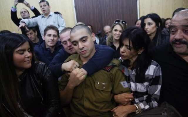 Elor Azaria, the Israeli soldier, who shot a Palestinian terrorist in Hebron arrives to the courtroom before the announcement of his verdict at at Hakirya military court in Tel Aviv.