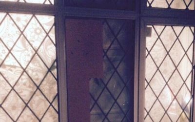 The smashed window, posted online by Shomrim North West London