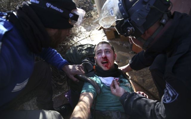 Israeli police evicts settlers from the West Bank outpost of Amona, (AP Photo/Oded Balilty)