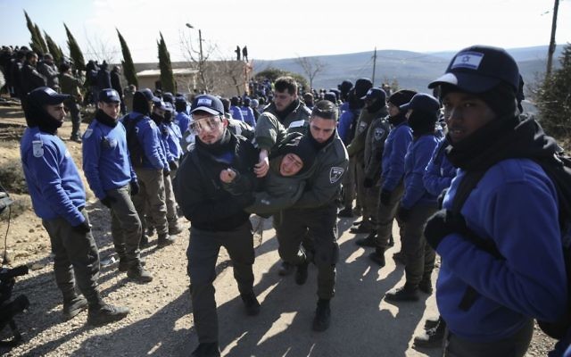 Israeli police evicts settlers from the West Bank outpost of Amona,  (AP Photo/Oded Balilty)