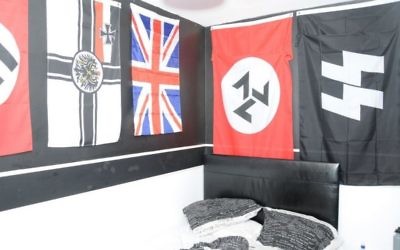 Nazi memorabilia in the bedroom of a teenager who made a pipe bomb, in a separate case 

(Photo credit: North East CTU/PA Wire)