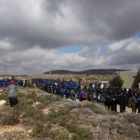 Israeli police evict settlers from the West Bank outpost of Amona, Wednesday. (Photo by: JINIPIX)