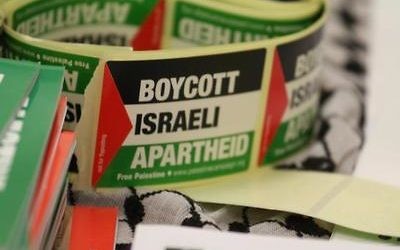 Stickers calling for a boycott of Israel