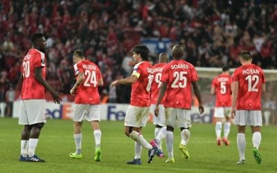 Hapoel Be'er Sheva celebrate their equaliser on Thursday night, though know they have to score at least three times in Thursday's second leg to reach the last 16.