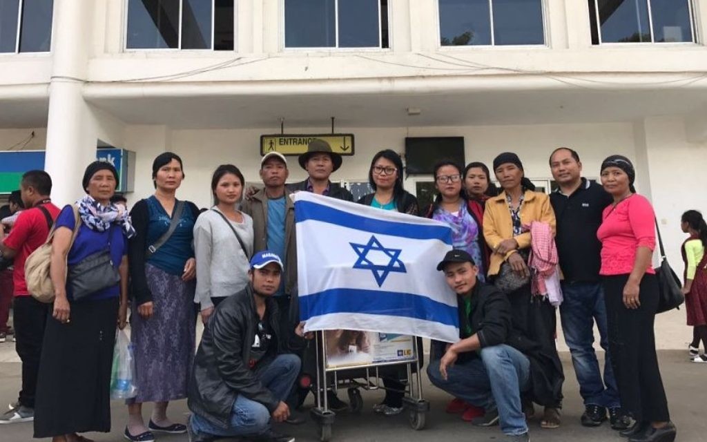 Unfurling an israeli flag at Lengpui airport