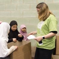 Jewish and Muslim volunteers collecting on Sadaqa Day