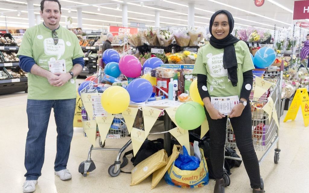Jewish and Muslim volunteers collecting on Sadaqa Day Jewish and Muslim volunteers collecting on Sadaqa Day