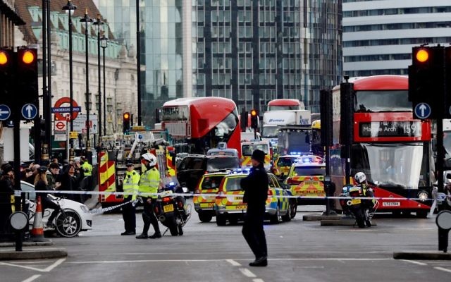 An Air Ambulance outside the Palace of Westminster, London, after sounds similar to gunfire have been heard close to the Palace of Westminster. A man with a knife has been seen within the confines of the Palace, eyewitnesses said. (Photo credit: Victoria Jones/PA Wire)