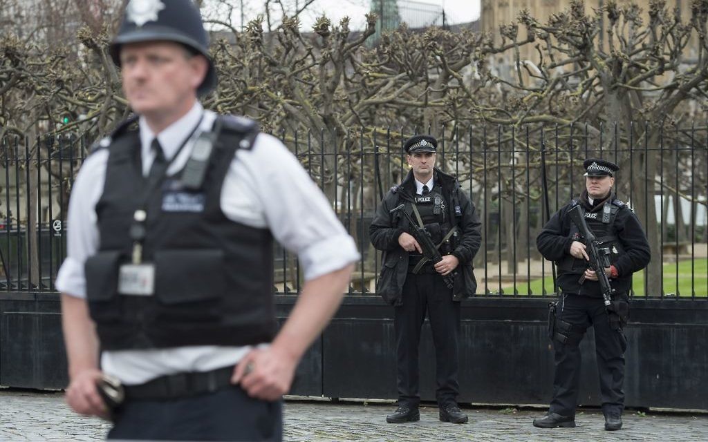 Police on Westminster Bridge in London, a week after the Westminster terror attack took place. (Photo credit: Yui Mok/PA Wire)