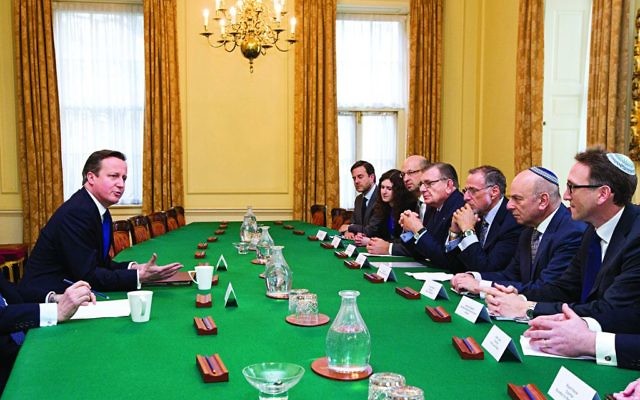 Sir Mick Davis (third from the left) in a meeting with Prime Minister David Cameron and other community leaders on the JLC