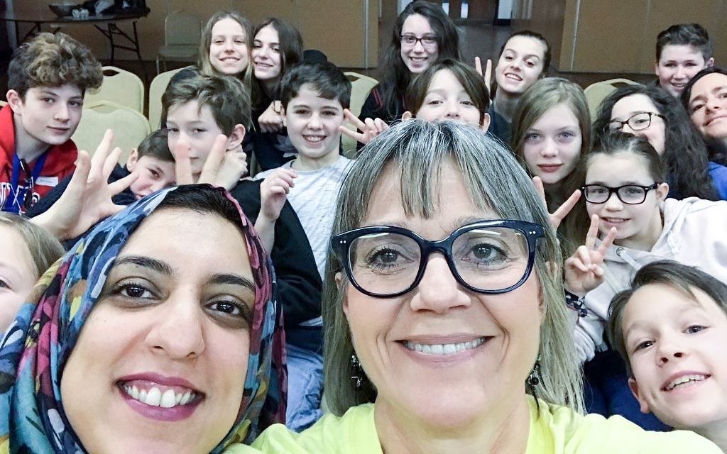 Jewish and Muslim volunteers on Sadaqa Day, including Laura Marks, founder of Mitzvah Day (centre-right) Jewish and Muslim volunteers on Sadaqa Day, including Laura Marks, founder of Mitzvah Day (centre-right)