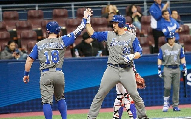 Team Israel celebrate their second win of the World Baseball Classic on Tuesday