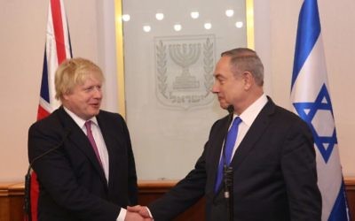 Boris Johnson (l) shaking Benjamin Netanyahu's hand (r) during their meeting in Jerusalem  in 2017