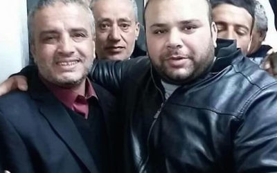 Ahmed Daqamseh (l) celebrating his release from prison