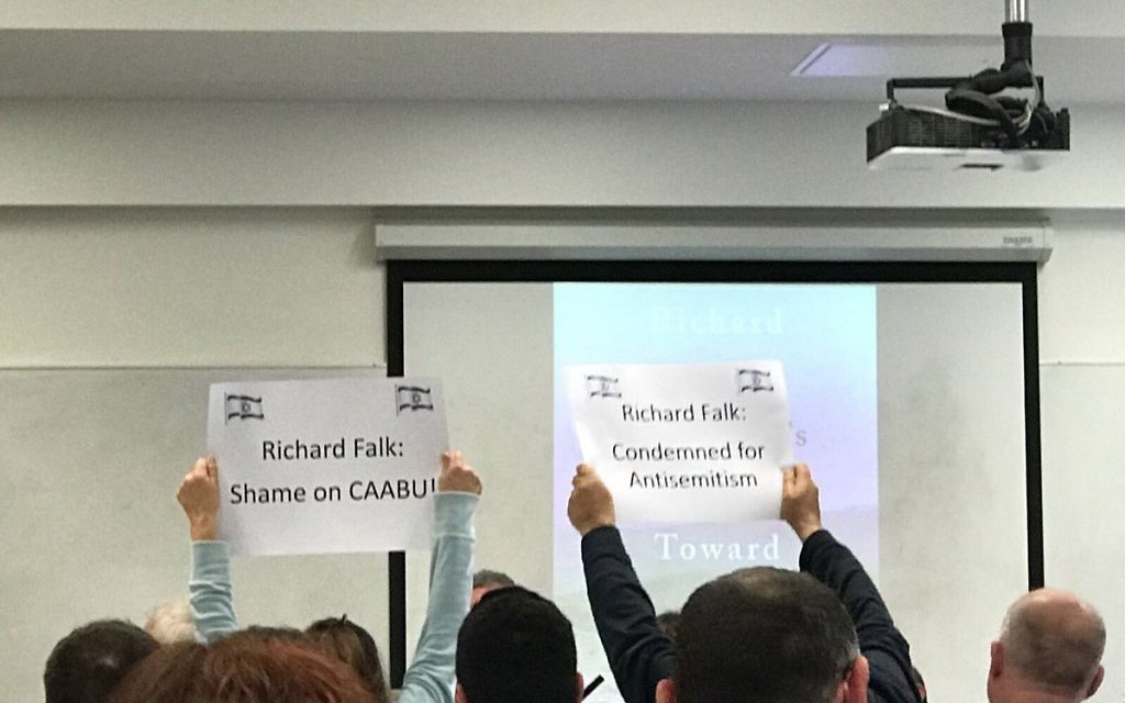 Pro-Israel protesters hold up signs during the event (Source: Elad Simchayoff on twitter)