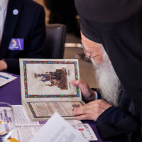 Archbishop Gregorios of the Greek Orthodox Church, Great Britain and Thyateira, reading a Hagaddah