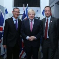 Boris Johnson (centre) with Mark Regev and David Quarrey