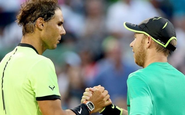 Nadal commiserates with Sela after beating him in their second round clash
