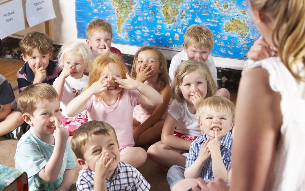 Kids learning in a primary school classroom