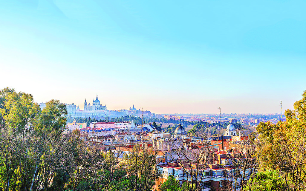 Sunrise panorama of Madrid with Royal Palace and  Almudena Cathedral.