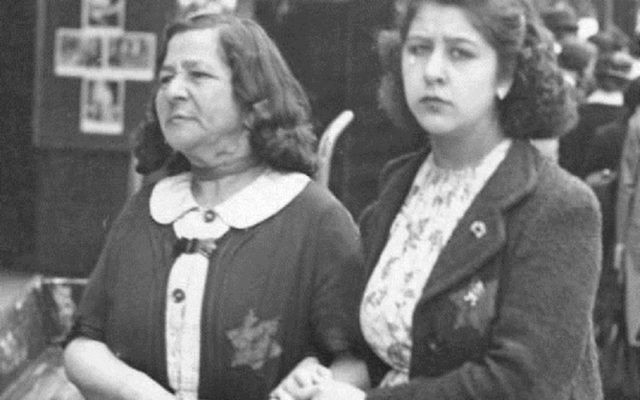 Two Jewish women in occupied Paris wearing the yellow Star of David badge in June 1942, a few weeks before the mass arrest